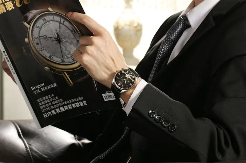 Men's automatic hollow tourbillon mechanical watch with 42mm dial and leather band on wrist