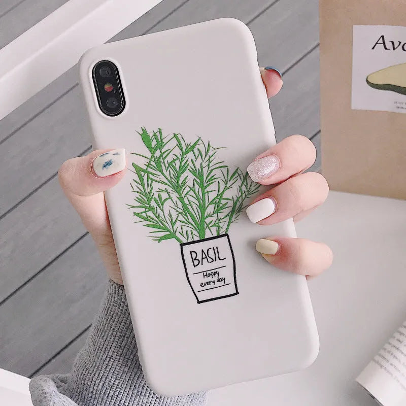 White silicone iPhone case with a detailed painted botanical plant design on the back.