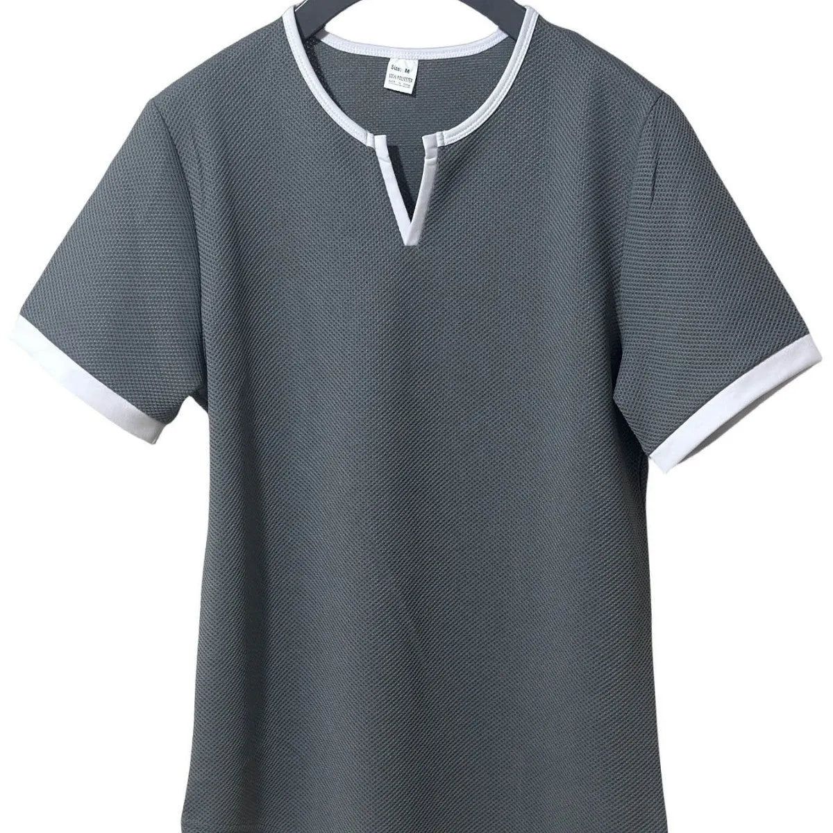 Men's colour-block V-neck outdoor sports T-shirt in waffle fabric on a hanger.