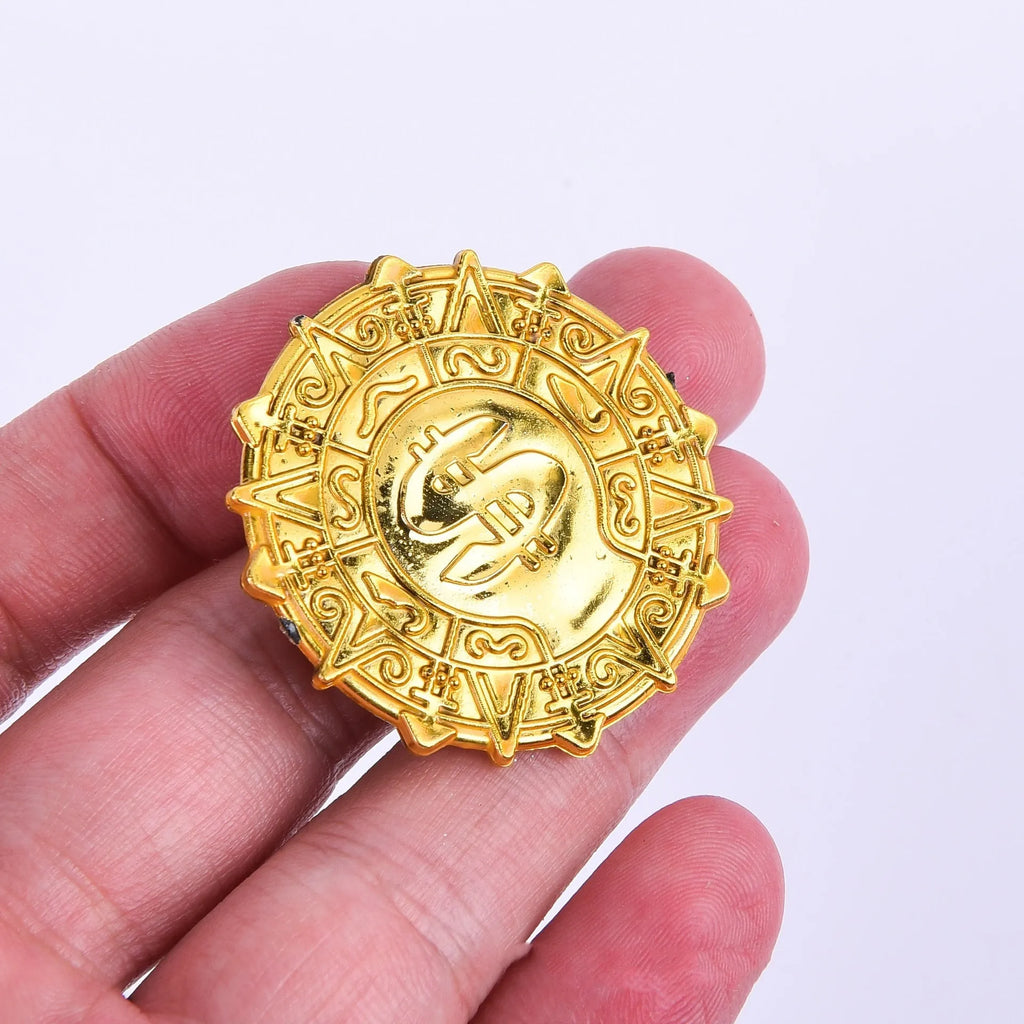 Plastic pirate gold coin toy with pointed design measuring 3.6cm diameter