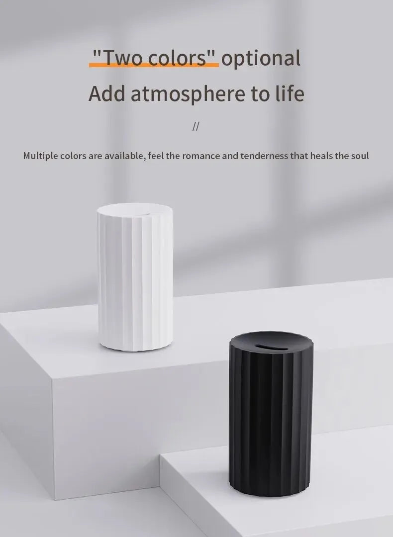 Black and white aromatherapy diffuser with LED flame effect and 100ml water tank for essential oils