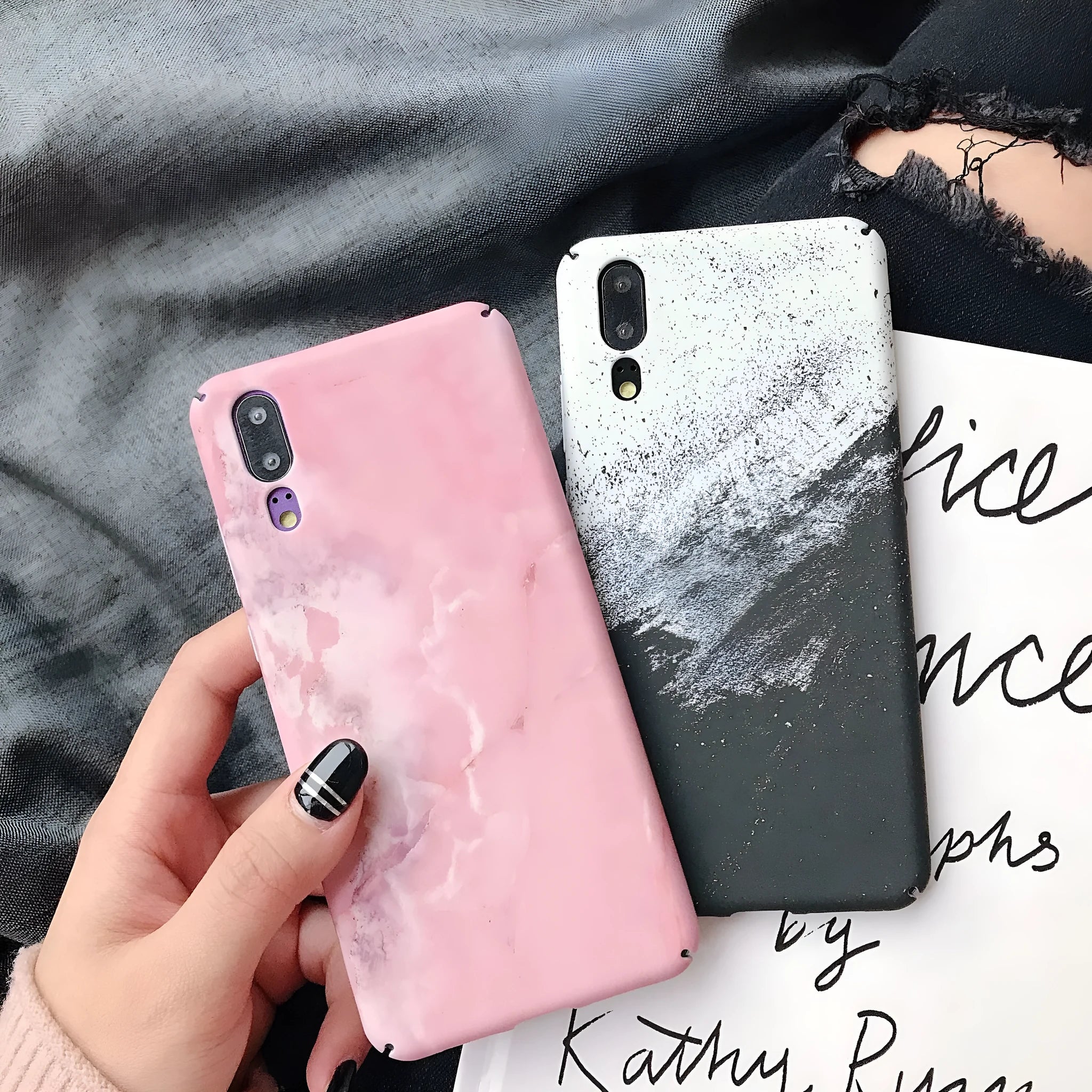 Painted solid colour phone case for Honor and Huawei smartphones in black or pink.