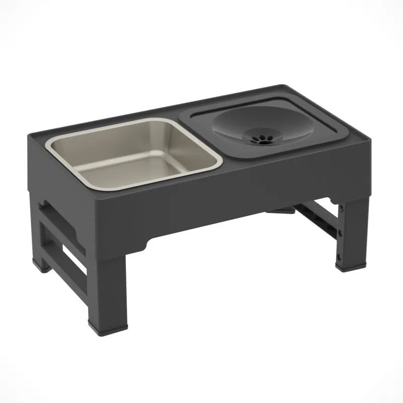 Adjustable height black and grey plastic dog feeder stand with two stainless steel bowls at medium setting
