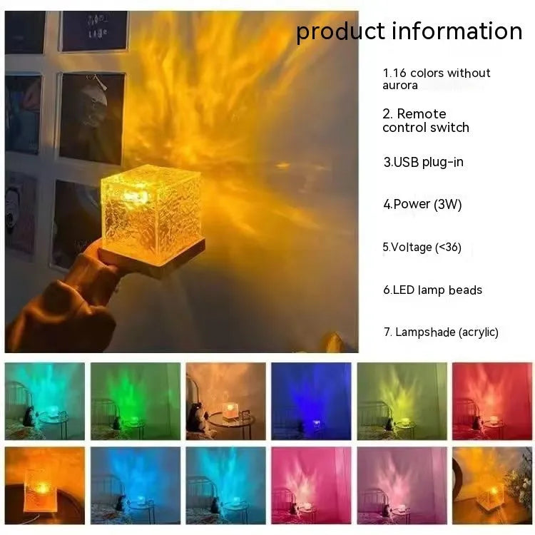 Square crystal LED table lamp projecting blue water ripple light patterns on a wall.