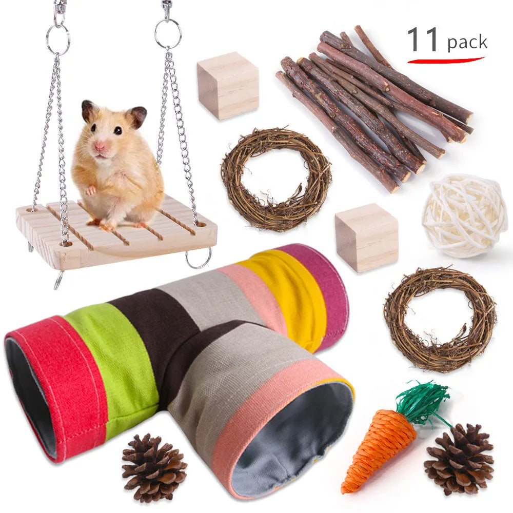 Assortment of natural wooden, straw, and woven toys for small pets including rabbits and parrots.