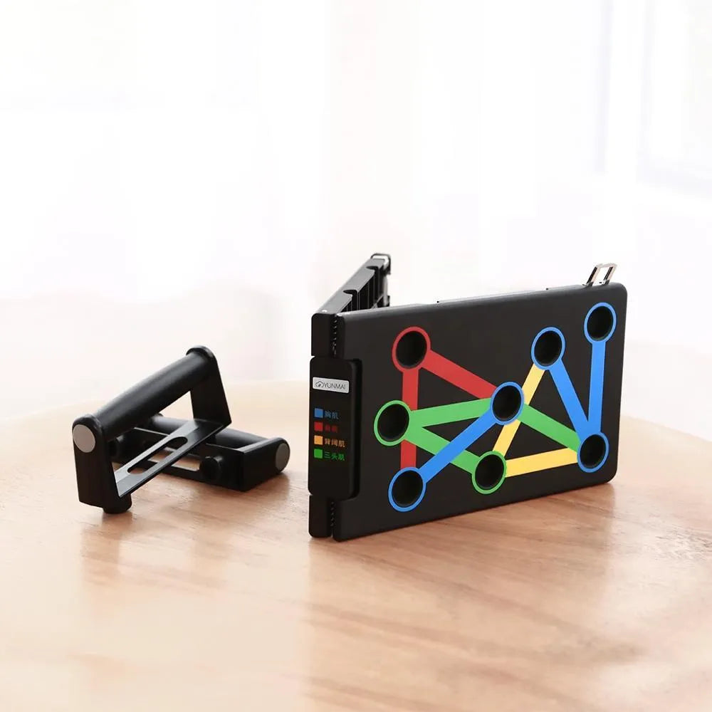 Yunmai black push up stand with two armrests and main board on a wooden floor