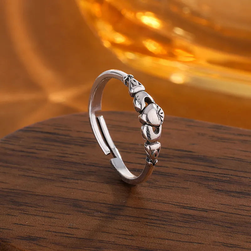 Women's heart-shaped open ring in retro silver colour made from copper material