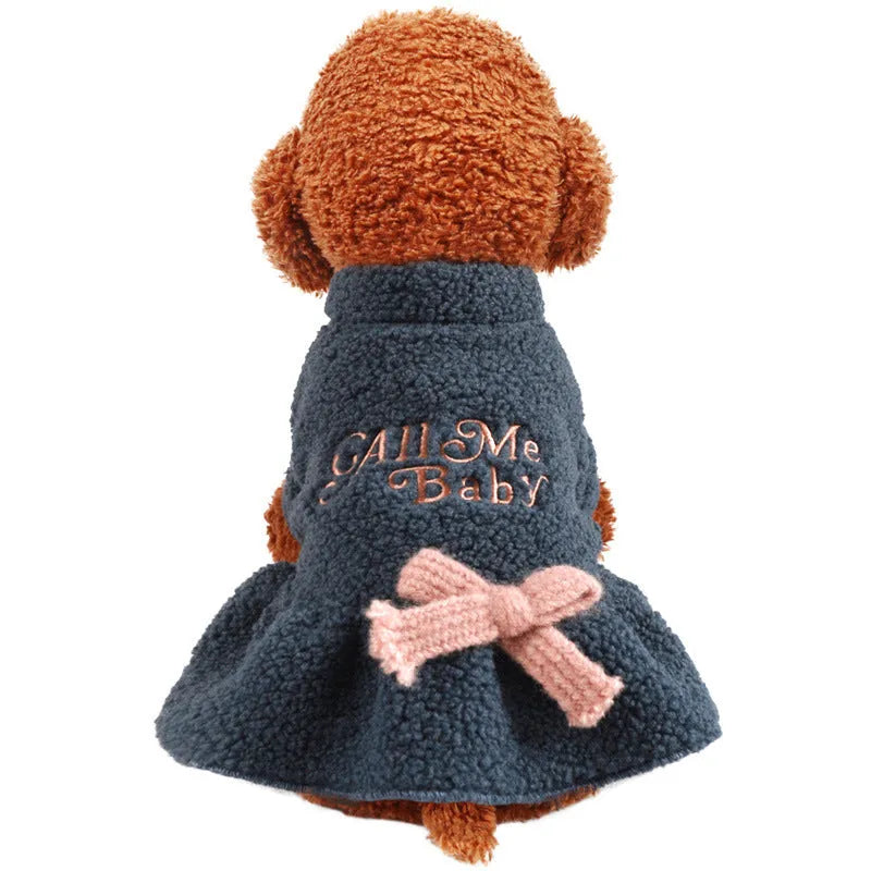 Dog wearing pink fleece skirt with baby letter pattern, Berber fleece pet clothing