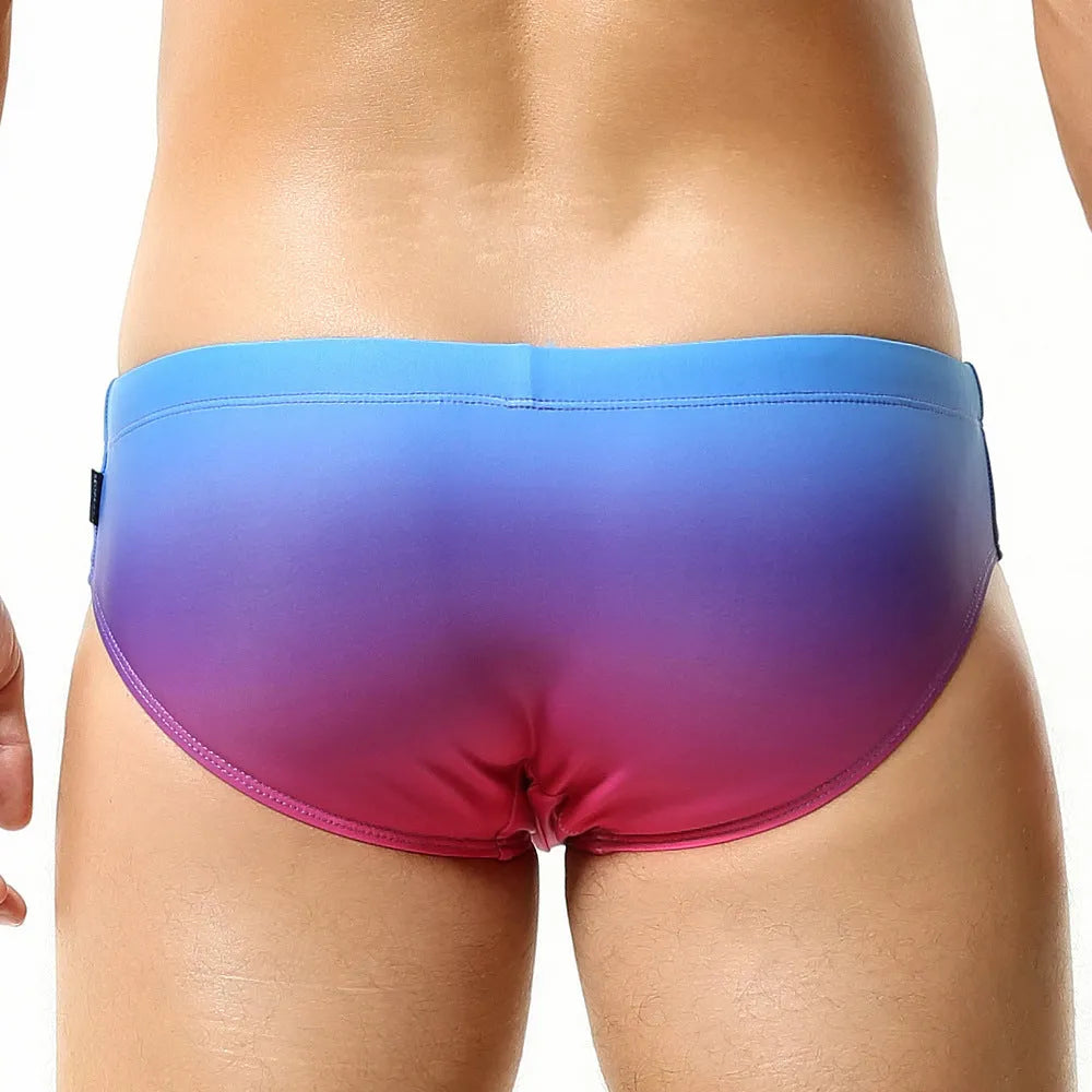Men's solid colour triangle brief swim trunks in blue, grey, green, or rose red