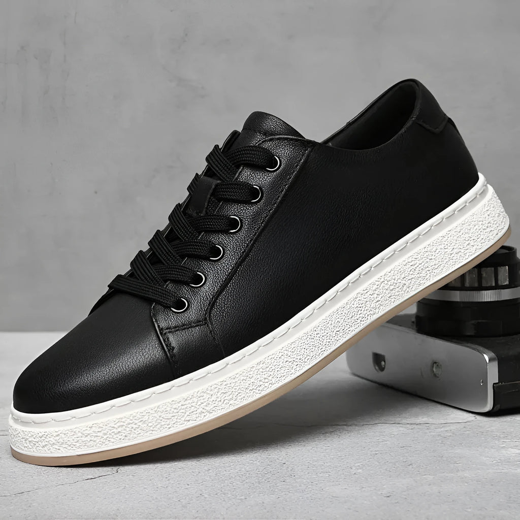 Men's black genuine leather lace-up low top sneakers with soft rubber sole and round toe, side view