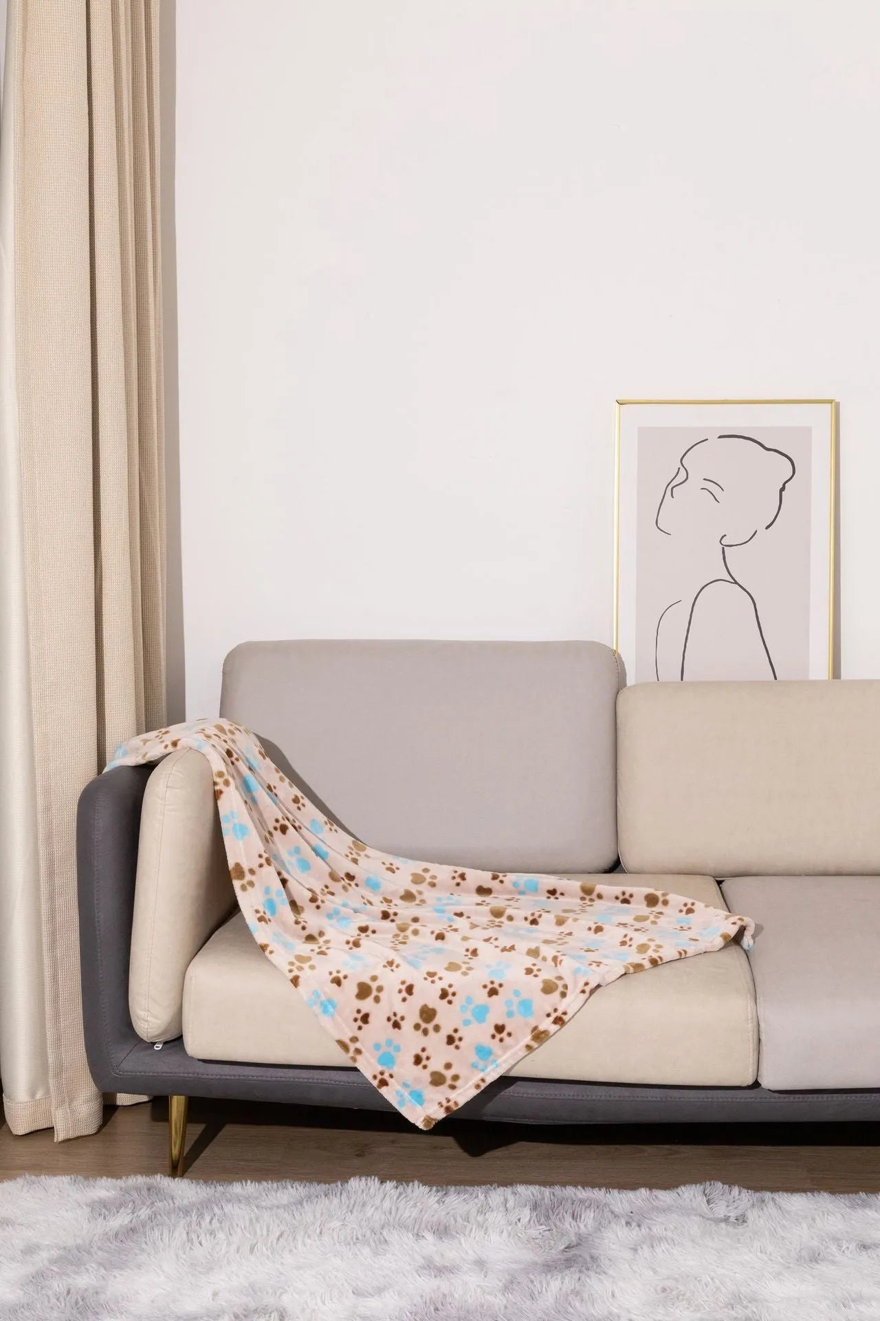 Blue cartoon dog paw pattern pet blanket showing double-sided thickened flannel texture
