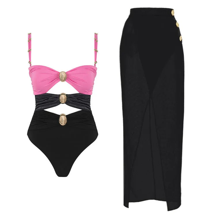 Women's solid colour one-piece swimsuit with matching skirt and gold button detail