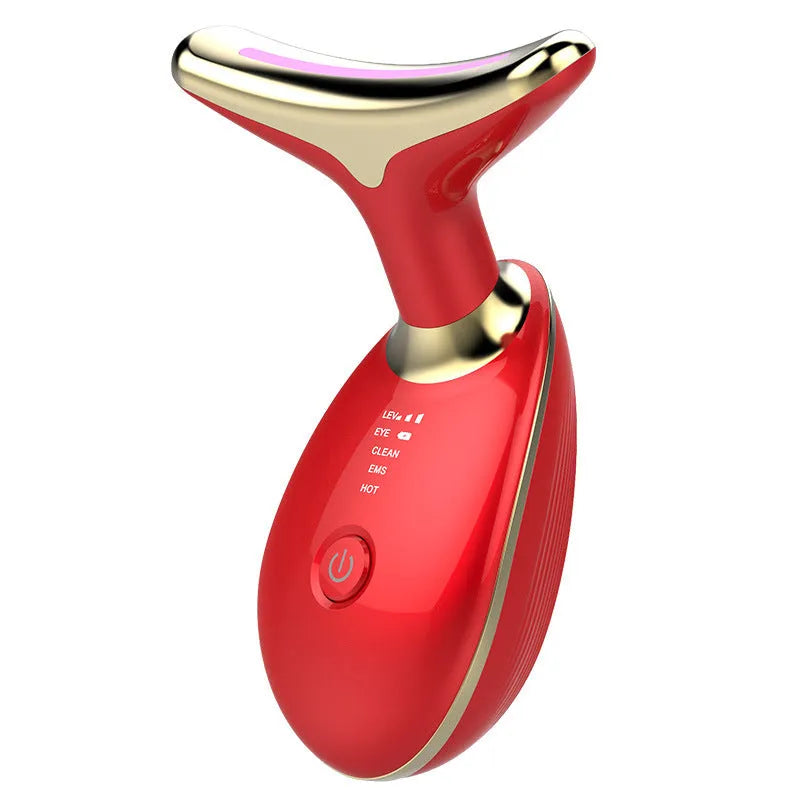 Black and silver EMS thermal neck lifting massager with LED lights on a skincare shelf.