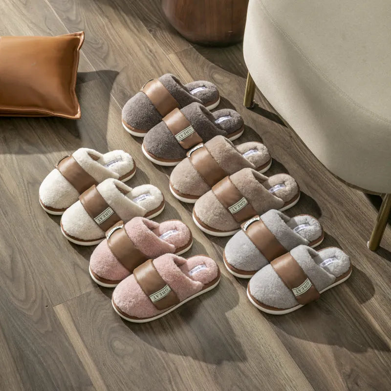 Beige plush cotton indoor slippers with Velcro strap and non-slip plastic sole.