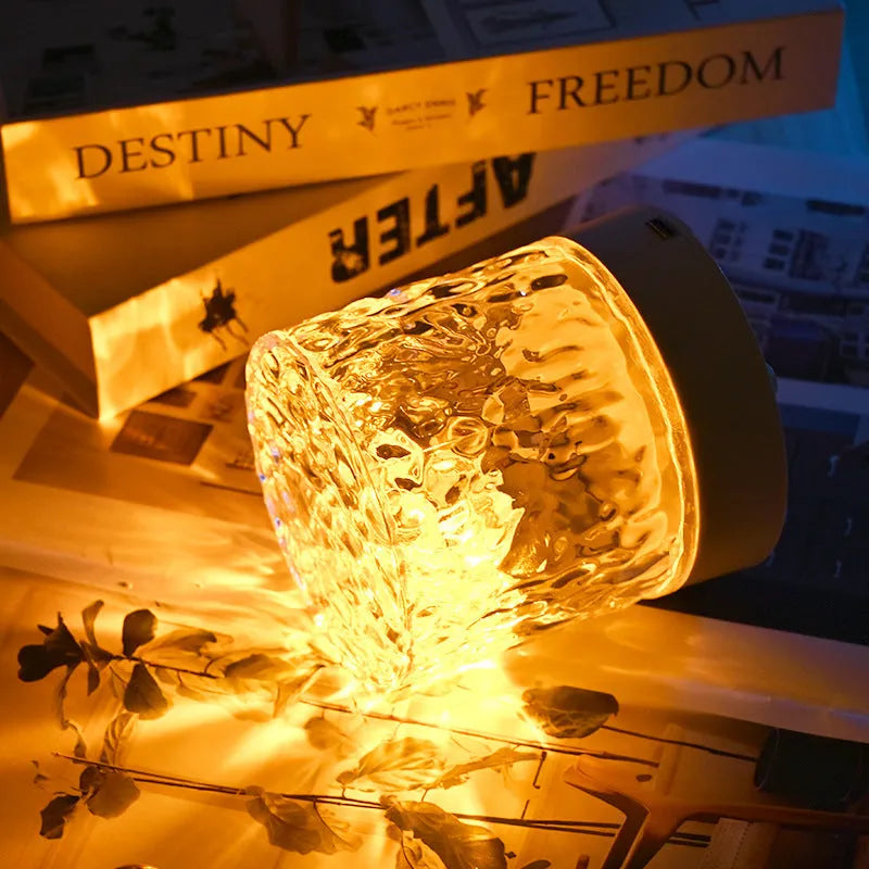 Crystal water ripple projector night light with acrylic lampshade, USB charging and touch control on a table