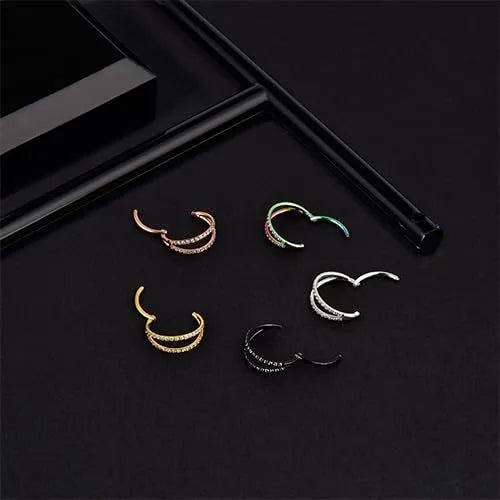 G23 titanium alloy nose ring in gold colour on a white background, showing a circular shape.