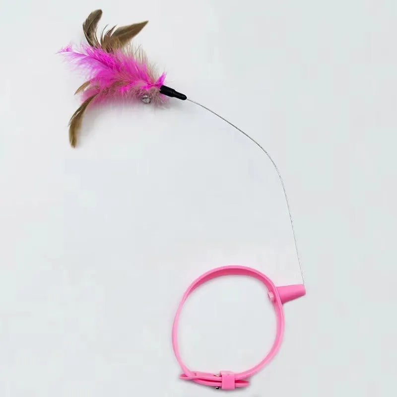 Blue adjustable cat collar with attached silicone teasing wand, feather, and bell for interactive play.