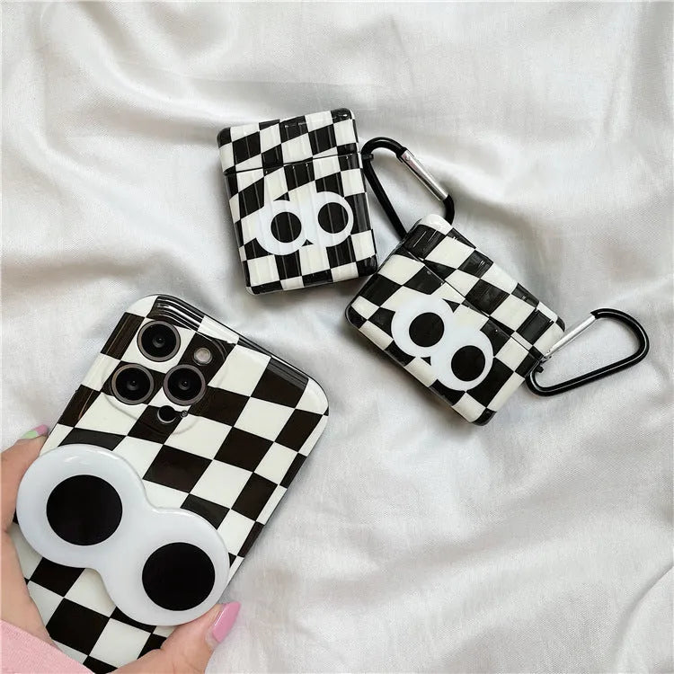 Checkerboard black and white grid TPU protective cover with large cartoon eyes for AirPods 1 2 3