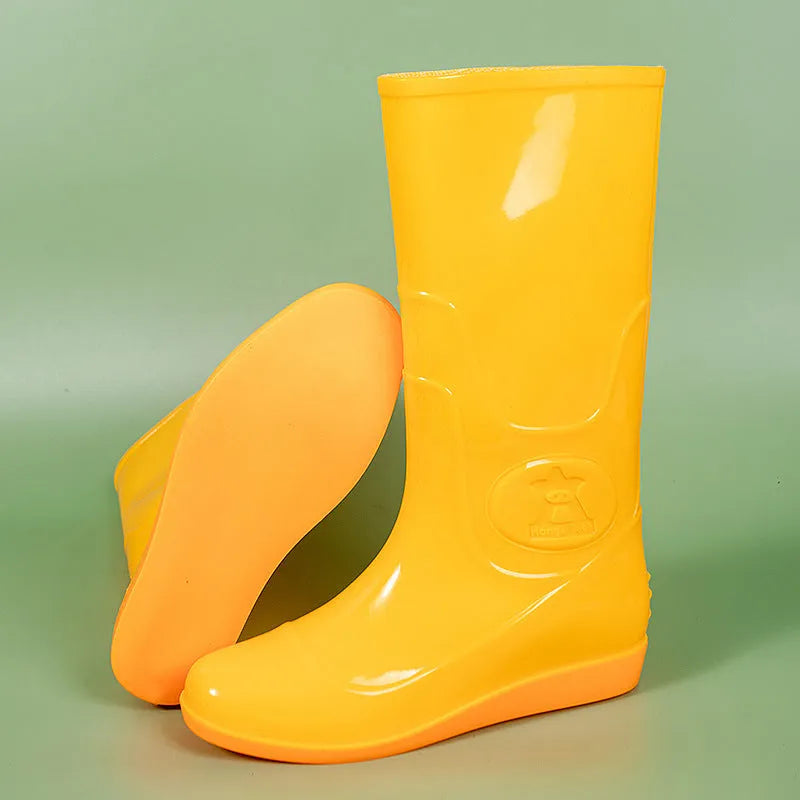 Men's white plastic high tube rain boots with a flat heel on a solid background.