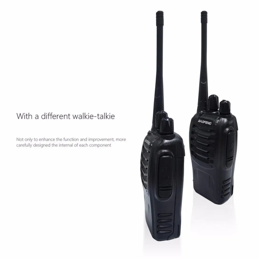 Black BF-888S walkie talkie with antenna and belt clip placed on dark surface