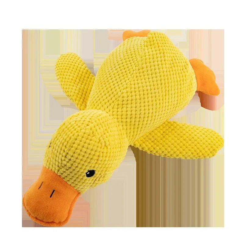 Yellow plush duck dog toy with squeaker for chewing and calming, size option shown