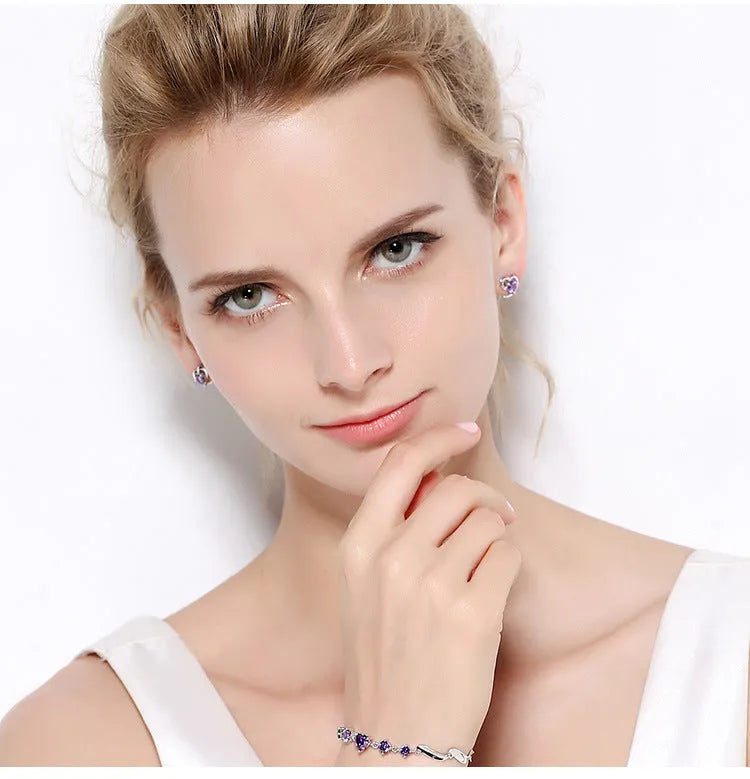 Silver heart-shaped zircon earrings for women, available in purple or white colour, with sterling silver inlay and electroplating finish.