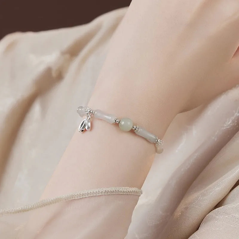 Handcrafted antique style sterling silver bracelet with Tianshan green bamboo centrepiece for women.