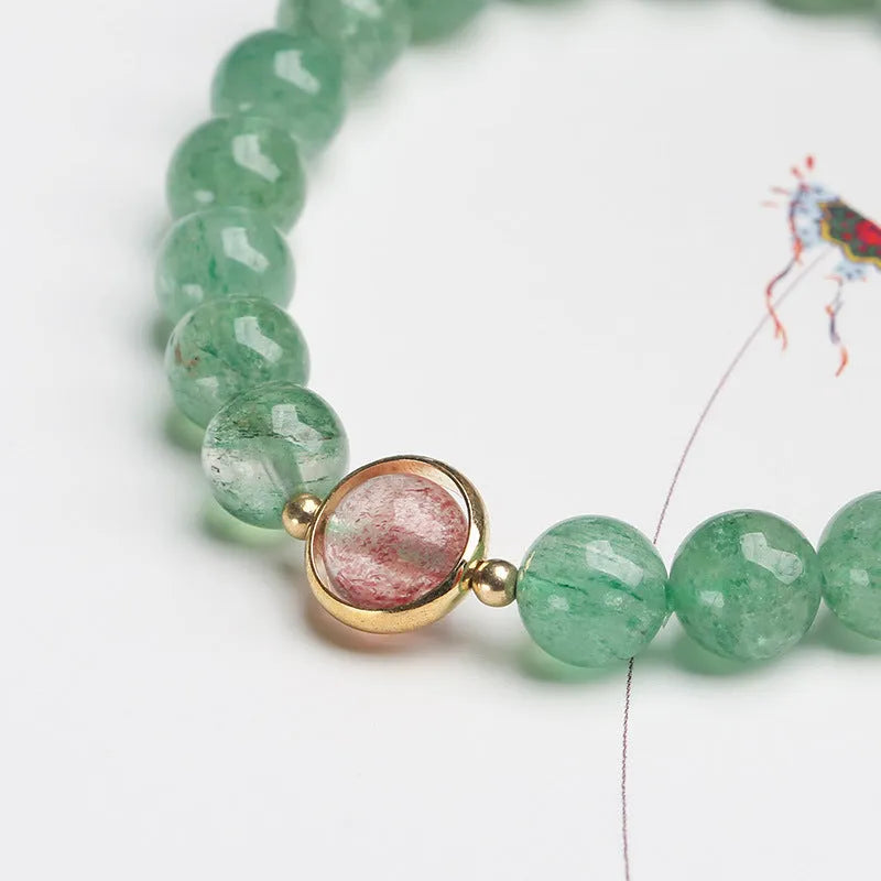 Green strawberry quartz Chinese style bracelet with 7.5mm beads and geometric hand-woven patterns