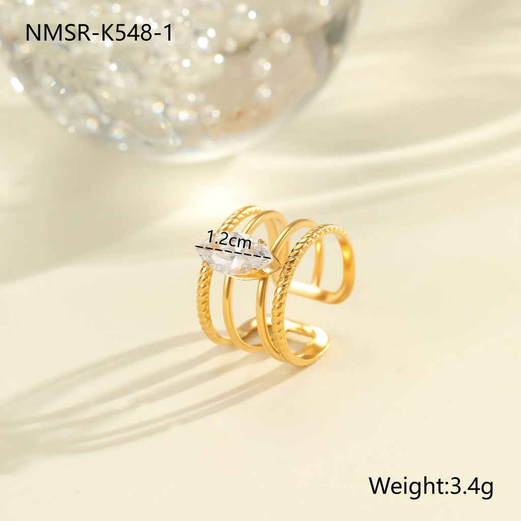 Gold electroplated geometric zircon ring with open mouth design on stainless steel