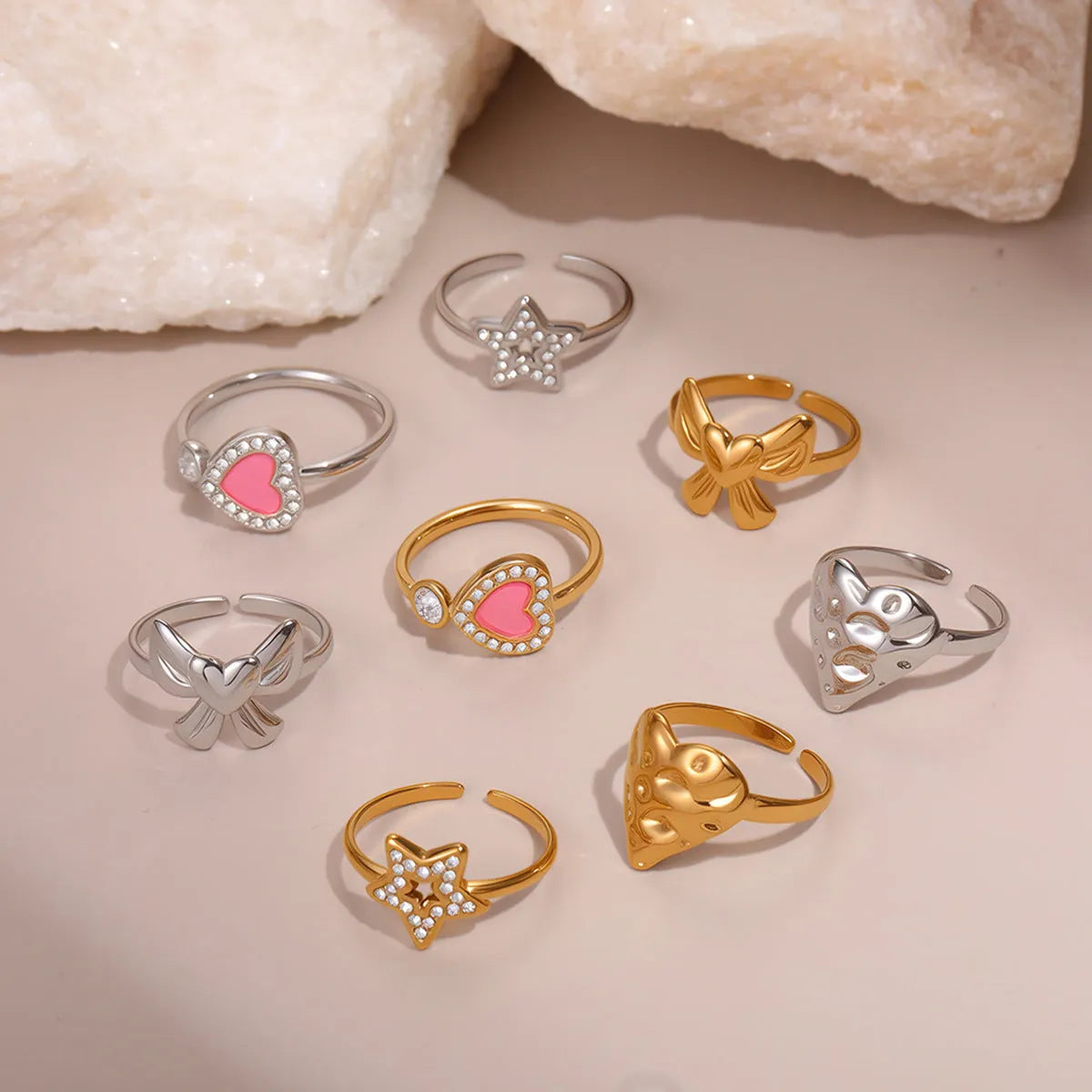 Heart-shaped stainless steel open ring for women with electroplated finish and geometric star design, average size.