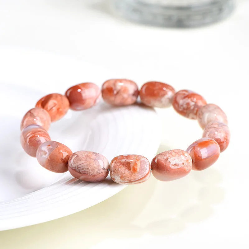 Natural cherry blossom colour agate barrel bead bracelet with Ruyi design elements