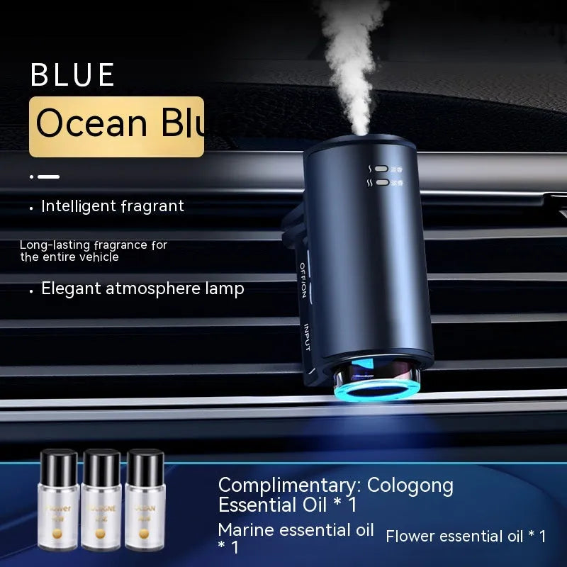 Obsidian black smart car aroma diffuser clipped onto a car air vent