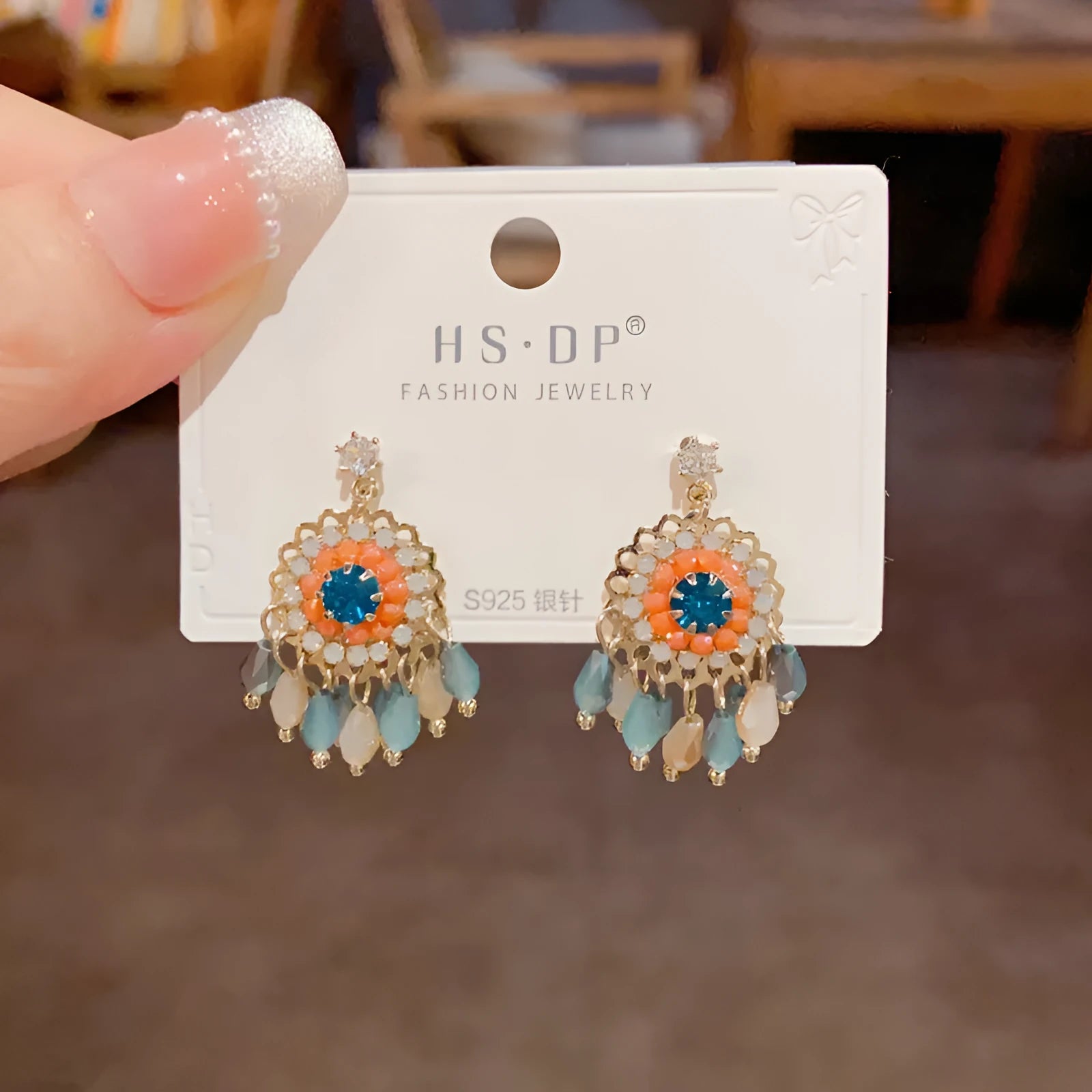 Geometric crystal tassel drop earrings with diamond embedded stones and thick gold plating