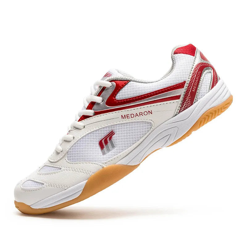 White and blue table tennis sneakers with lace-up front, round toe, and rubber sole.