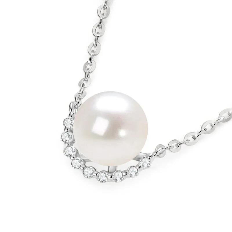 Women's 925 sterling silver geometric pendant necklace with pearl inlay and rhinestone accents, available in gold colour finish.