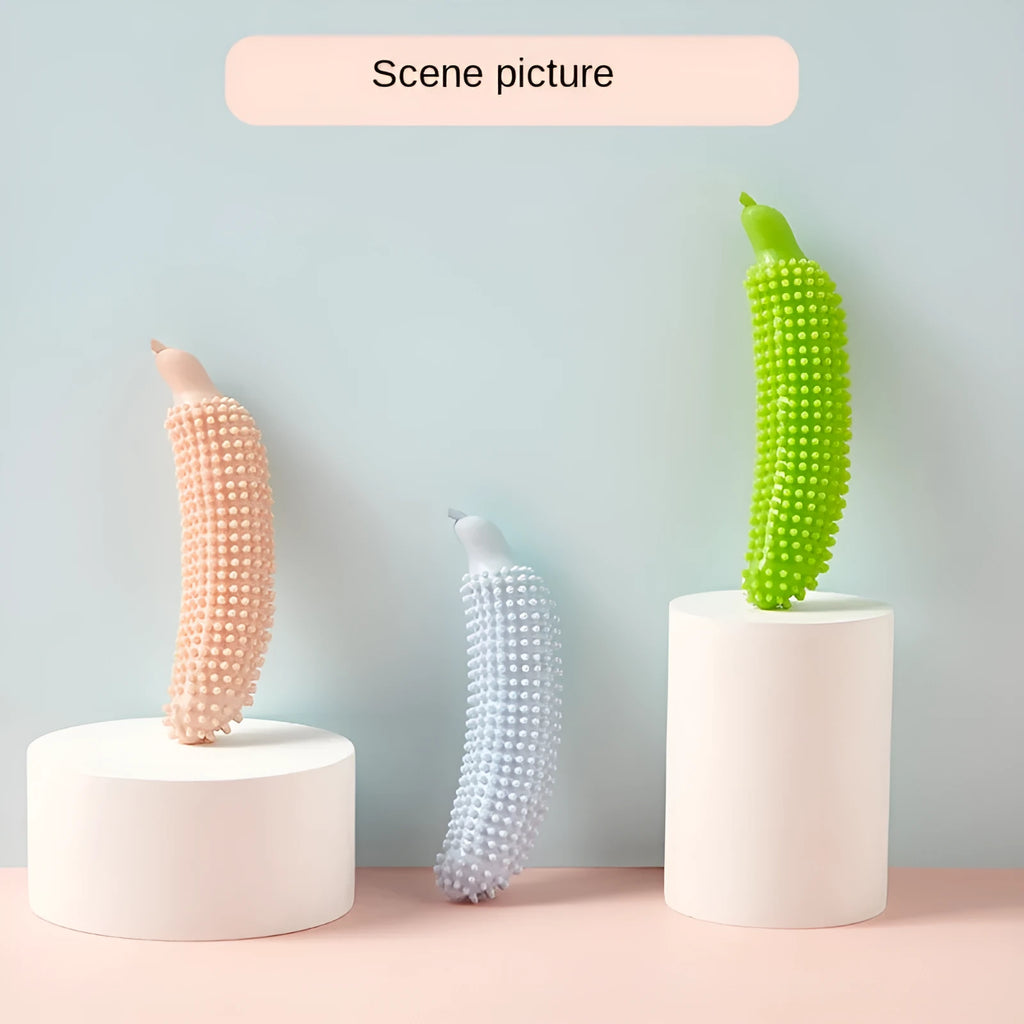Green cucumber-shaped dog teething toy with bite-resistant construction for puppies
