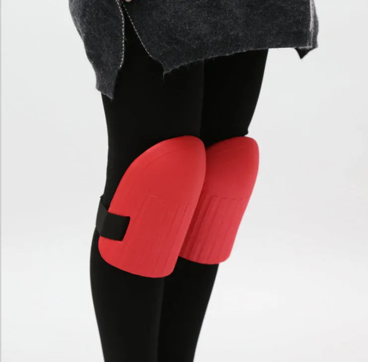 A pair of EVA foam knee pads in army green colour, showing their rectangular shape and thickness.
