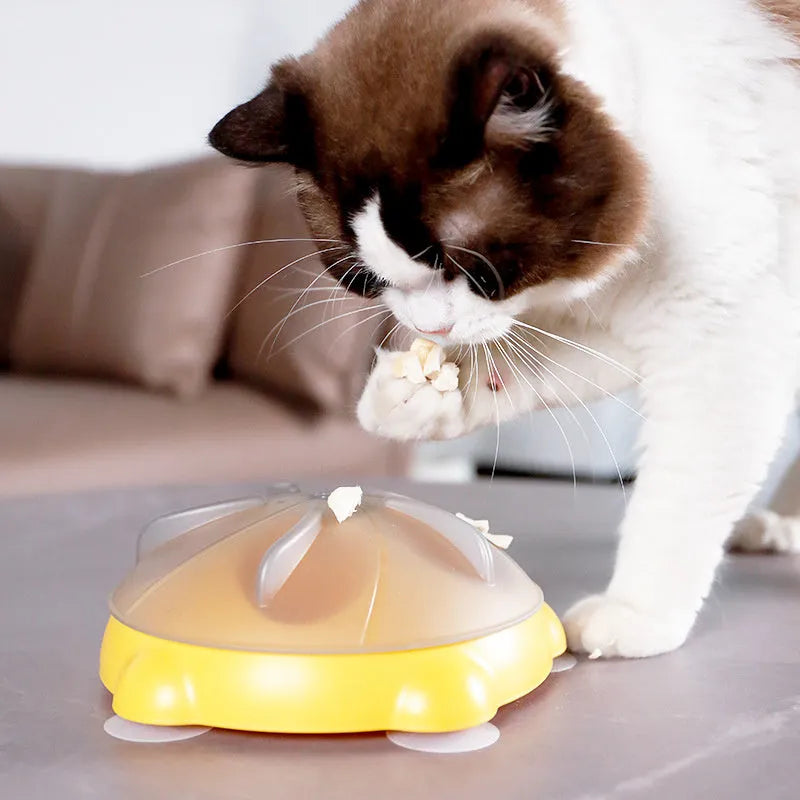 Bright yellow interactive cat toy and snack bowl for pet entertainment and feeding.
