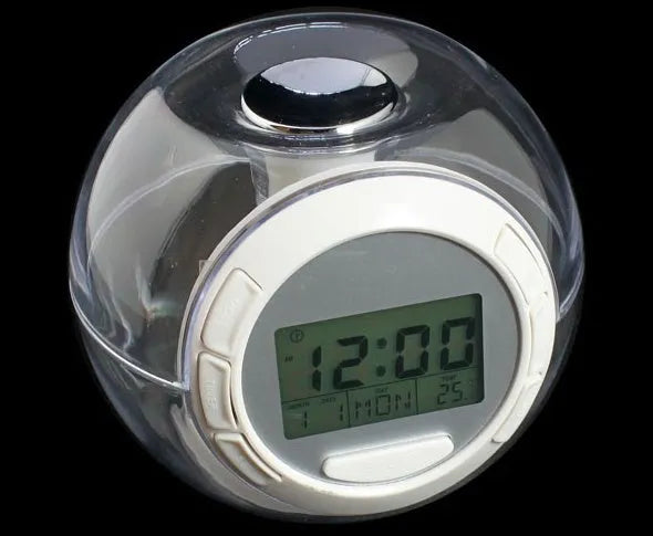 White colourful natural sound alarm clock with LCD display showing time and date
