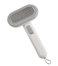 Large light grey pet hair removal comb with floating teeth and a one-click shaver head for cats and dogs.