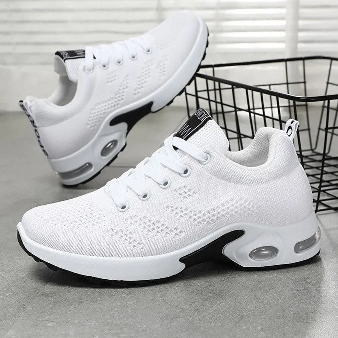 Breathable soft sole women's sneakers in 814 black with mesh lining, PVC sole, low heel, and round toe design