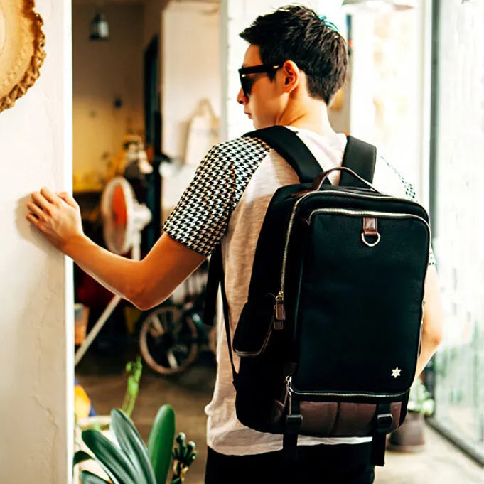 Modern men's backpack in durable Oxford cloth, shown in Army Green colour, with dimensions 30cm wide by 46cm high.