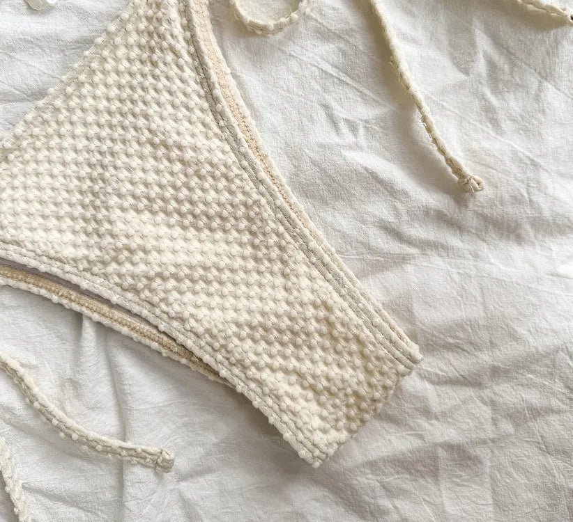 Women's halter neck lace-up bikini swimsuit in polyester fabric, available in white, green and milky white