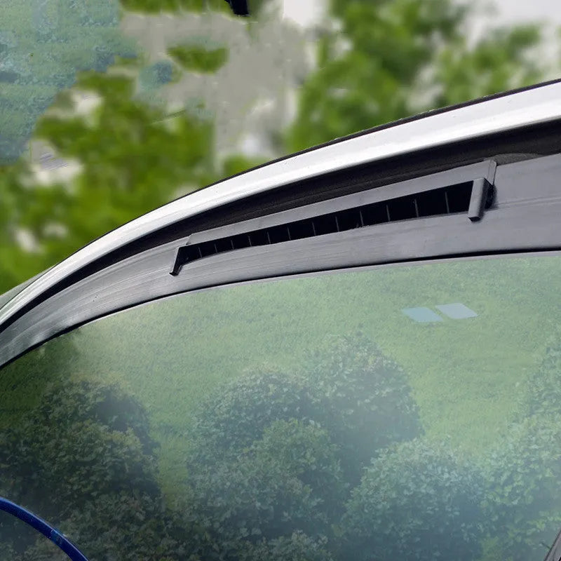 Black and white car ventilation fan unit with USB cable for dashboard exhaust odour removal