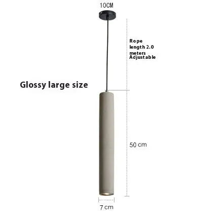 Cement industrial droplight in glossy finish on a wooden bedside table