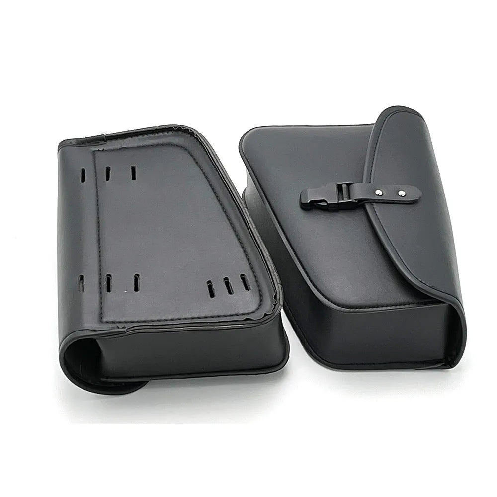 Black PU leather motorcycle swingarm saddlebag mounted on a Harley Sportster rear wheel assembly.