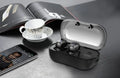 White wireless TWS sports earbuds and a small rectangular charging case on a grey background.