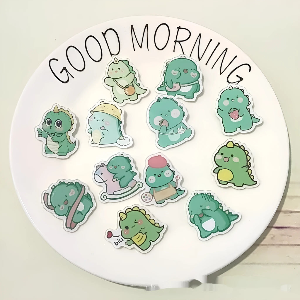 Cartoon dinosaur acrylic badge brooch with printed design and pin fastening, shown in one of twelve colour styles