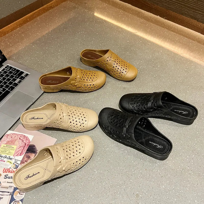 Apricot, black, and brown fairy style PVC half slippers with flat toe box on a white background.