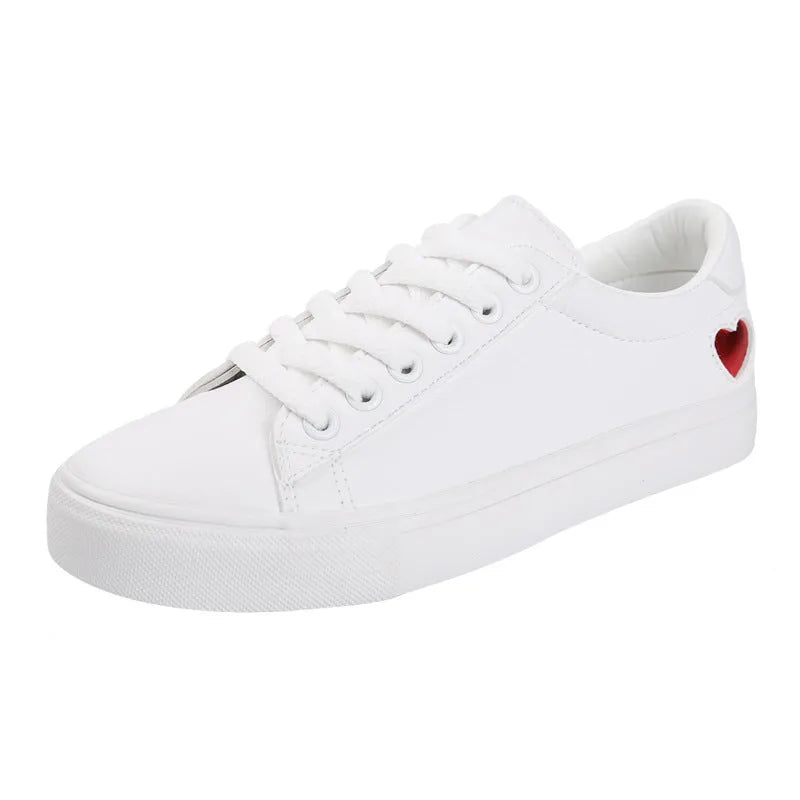 Women's PU leather heart flats shoes with colourful beads and stainless steel pendant on white background